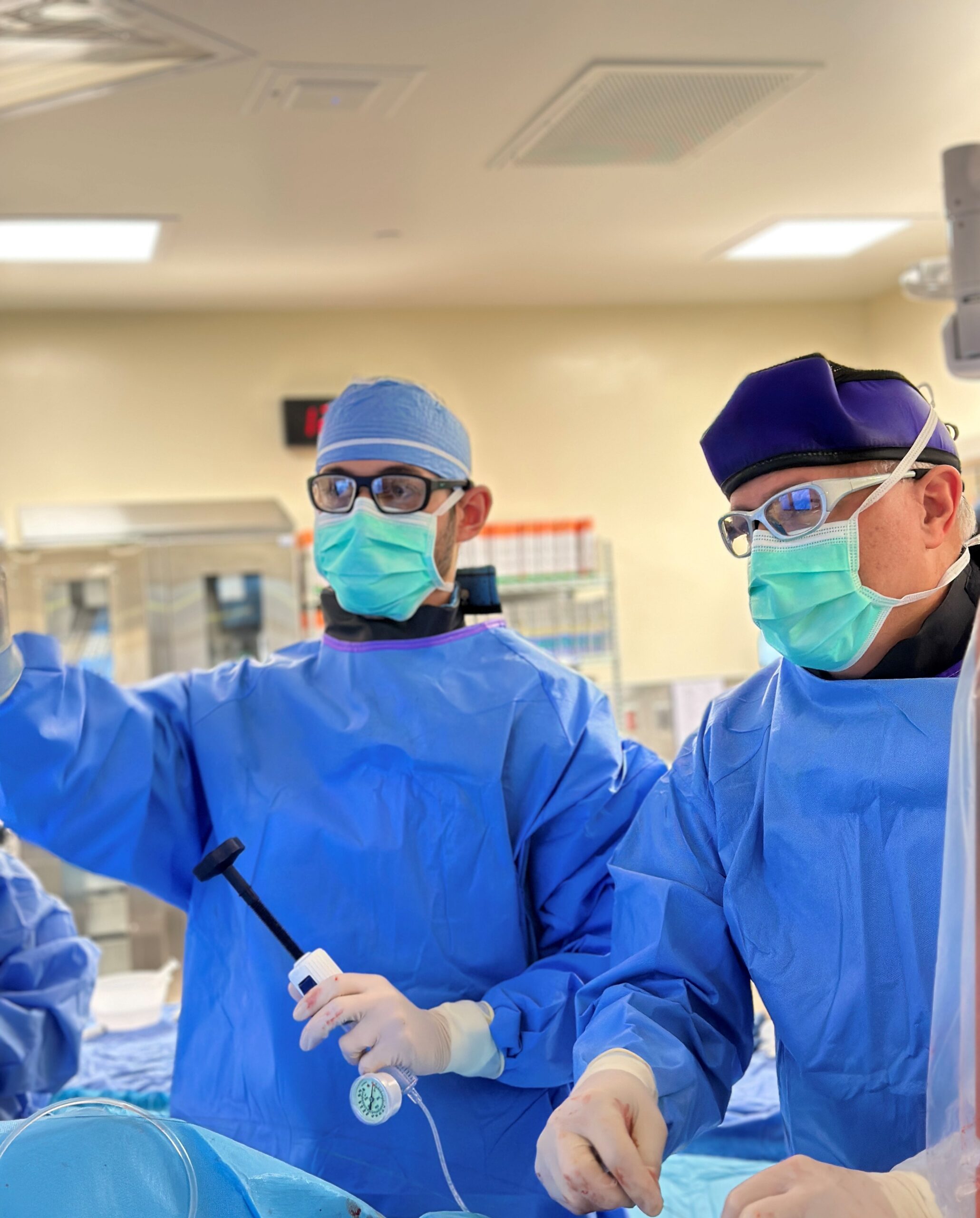 Dr. Yan Yatsynovich, interventional cardiologist, and Dr. Stacy Brewington, interventional cardiologist, perform a heart stent with drug-coated balloon to treat coronary IRS.