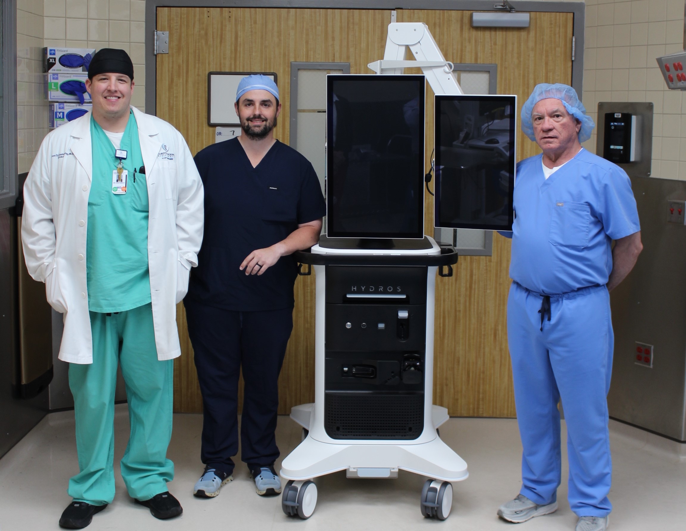 Dr. Jason Easterday, Dr. Hunter Lambert and Dr. Rick Smith with the new Hydros Aquablation therapy system.